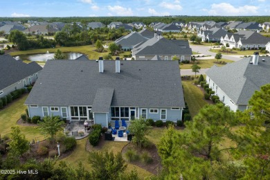 This stunning home in The Towns of St. James Plantation offers on Members Club At St. James Plantation in North Carolina - for sale on GolfHomes.com, golf home, golf lot