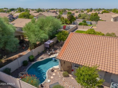 This charming 4-bedroom, 2-bath home is located in the on Augusta Ranch Golf Club in Arizona - for sale on GolfHomes.com, golf home, golf lot