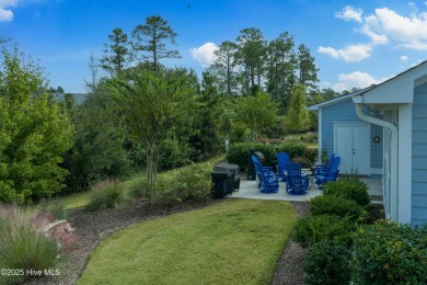 This stunning home in The Towns of St. James Plantation offers on Members Club At St. James Plantation in North Carolina - for sale on GolfHomes.com, golf home, golf lot