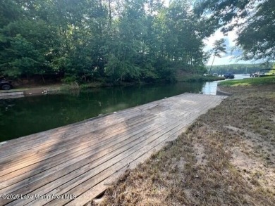 Large, waterfront mostly cleared lot with ample space for on Lake Winds Golf Course in Alabama - for sale on GolfHomes.com, golf home, golf lot