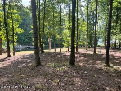 Large, waterfront mostly cleared lot with ample space for on Lake Winds Golf Course in Alabama - for sale on GolfHomes.com, golf home, golf lot