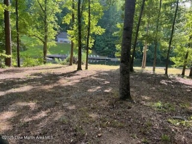 Large, waterfront mostly cleared lot with ample space for on Lake Winds Golf Course in Alabama - for sale on GolfHomes.com, golf home, golf lot