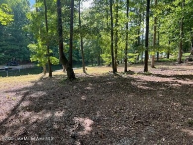 Large, waterfront mostly cleared lot with ample space for on Lake Winds Golf Course in Alabama - for sale on GolfHomes.com, golf home, golf lot