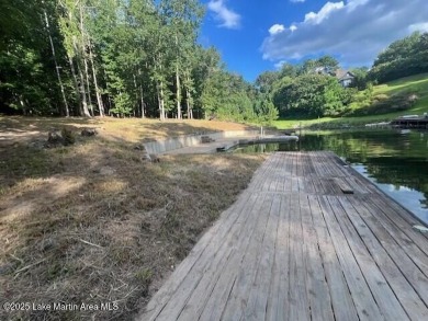 Large, waterfront mostly cleared lot with ample space for on Lake Winds Golf Course in Alabama - for sale on GolfHomes.com, golf home, golf lot