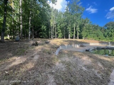 Large, waterfront mostly cleared lot with ample space for on Lake Winds Golf Course in Alabama - for sale on GolfHomes.com, golf home, golf lot