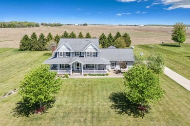 Step into timeless elegance with this stunning two-story on Dyersville Golf and Country Club in Iowa - for sale on GolfHomes.com, golf home, golf lot