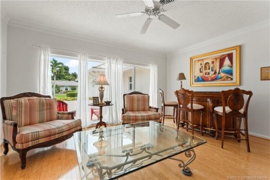 Wake up every day to the beauty of Florida living in this CBS on Yacht and Country Club in Florida - for sale on GolfHomes.com, golf home, golf lot