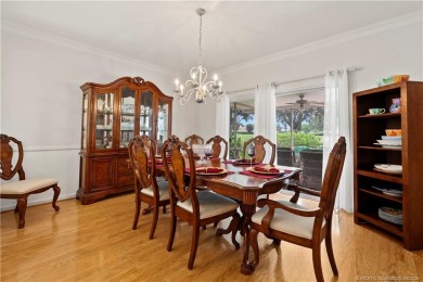 Wake up every day to the beauty of Florida living in this CBS on Yacht and Country Club in Florida - for sale on GolfHomes.com, golf home, golf lot