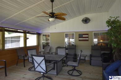 Deeded lot all the way down to the water in Roland subdivision on Players Course At Wyboo Plantation in South Carolina - for sale on GolfHomes.com, golf home, golf lot
