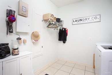 Own the coastal Florida lifestyle in the quaint community of on Tiger Point Golf and Country Club in Florida - for sale on GolfHomes.com, golf home, golf lot