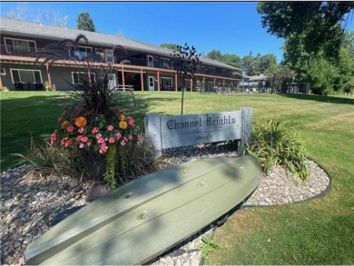 Boat the channel out to beautiful Pelican Lake! Prepare to enjoy on Breezy Point Golf Course Resort in Minnesota - for sale on GolfHomes.com, golf home, golf lot