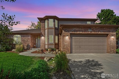 All-brick charmer on a cul-de-sac! This gorgeous home in the on The Olde Course At Loveland in Colorado - for sale on GolfHomes.com, golf home, golf lot