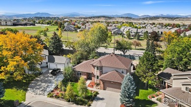 All-brick charmer on a cul-de-sac! This gorgeous home in the on The Olde Course At Loveland in Colorado - for sale on GolfHomes.com, golf home, golf lot