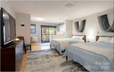 Great upper corner unit with no building next door. Located at on Rumbling Bald Resort on Lake Lure in North Carolina - for sale on GolfHomes.com, golf home, golf lot