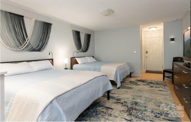 Great upper corner unit with no building next door. Located at on Rumbling Bald Resort on Lake Lure in North Carolina - for sale on GolfHomes.com, golf home, golf lot