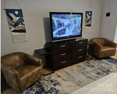 Great upper corner unit with no building next door. Located at on Rumbling Bald Resort on Lake Lure in North Carolina - for sale on GolfHomes.com, golf home, golf lot