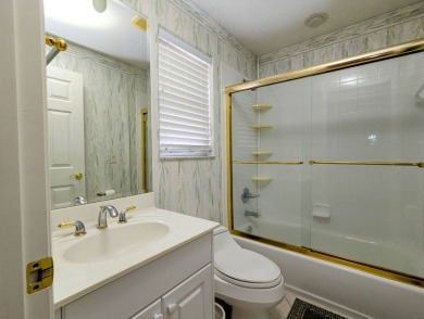 The perfect home for the RV community or convert the RV garage on The Great Outdoors Golf and Country Club in Florida - for sale on GolfHomes.com, golf home, golf lot