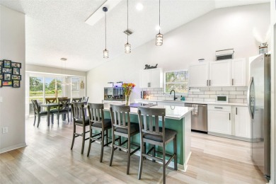 Welcome to your dream home--fully renovated and perfectly on Meadow Oaks Golf and Country Club in Florida - for sale on GolfHomes.com, golf home, golf lot