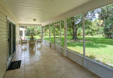 The perfect home for the RV community or convert the RV garage on The Great Outdoors Golf and Country Club in Florida - for sale on GolfHomes.com, golf home, golf lot
