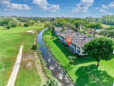 Updated first-floor condo w/ golf course views in Palm Aire CC! on  in Florida - for sale on GolfHomes.com, golf home, golf lot