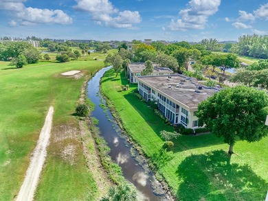 Updated first-floor condo w/ golf course views in Palm Aire CC! on  in Florida - for sale on GolfHomes.com, golf home, golf lot
