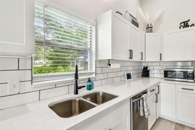 Welcome to your dream home--fully renovated and perfectly on Meadow Oaks Golf and Country Club in Florida - for sale on GolfHomes.com, golf home, golf lot