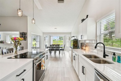 Welcome to your dream home--fully renovated and perfectly on Meadow Oaks Golf and Country Club in Florida - for sale on GolfHomes.com, golf home, golf lot
