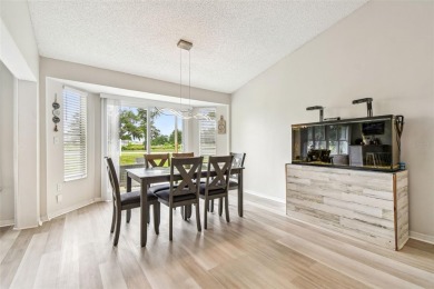 Welcome to your dream home--fully renovated and perfectly on Meadow Oaks Golf and Country Club in Florida - for sale on GolfHomes.com, golf home, golf lot