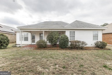 Step out your back door and play a round of golf as this 2BR/2BA on The International City Golf Course in Georgia - for sale on GolfHomes.com, golf home, golf lot