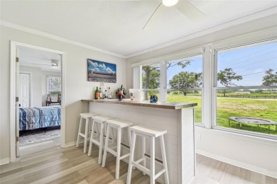 Welcome to your dream home--fully renovated and perfectly on Meadow Oaks Golf and Country Club in Florida - for sale on GolfHomes.com, golf home, golf lot