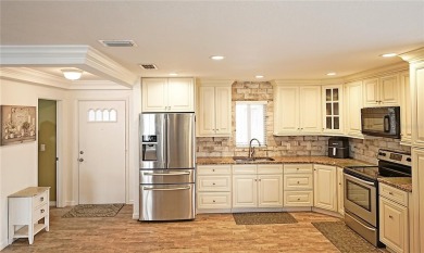 Welcome to Summer Green! This stunning, cozy 2bed/2bath second on Capri Isle Golf Club in Florida - for sale on GolfHomes.com, golf home, golf lot