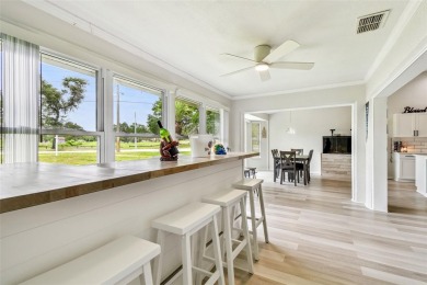 Welcome to your dream home--fully renovated and perfectly on Meadow Oaks Golf and Country Club in Florida - for sale on GolfHomes.com, golf home, golf lot