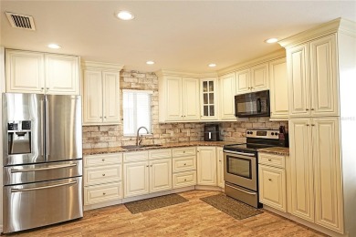 Welcome to Summer Green! This stunning, cozy 2bed/2bath second on Capri Isle Golf Club in Florida - for sale on GolfHomes.com, golf home, golf lot