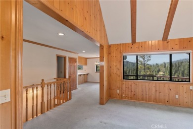 Level entry to a two-car garage mountain home with 3 bedrooms on Lake Arrowhead Country Club in California - for sale on GolfHomes.com, golf home, golf lot