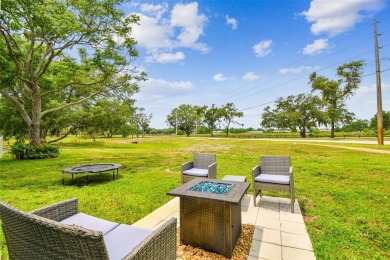 Welcome to your dream home--fully renovated and perfectly on Meadow Oaks Golf and Country Club in Florida - for sale on GolfHomes.com, golf home, golf lot