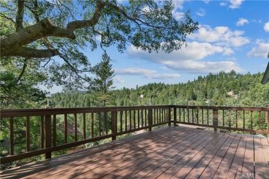 Level entry to a two-car garage mountain home with 3 bedrooms on Lake Arrowhead Country Club in California - for sale on GolfHomes.com, golf home, golf lot