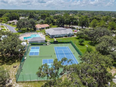Welcome to your dream home--fully renovated and perfectly on Meadow Oaks Golf and Country Club in Florida - for sale on GolfHomes.com, golf home, golf lot