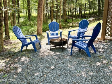 Charming Chalet with OVERSIZED SCREENED-IN PORCH in Amenity-Rich on The Hideout Golf in Pennsylvania - for sale on GolfHomes.com, golf home, golf lot