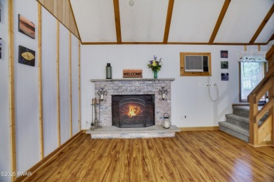Charming Chalet with OVERSIZED SCREENED-IN PORCH in Amenity-Rich on The Hideout Golf in Pennsylvania - for sale on GolfHomes.com, golf home, golf lot