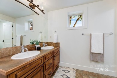 A spacious home backing to Quail Hollow Golf Course! Enjoy on Quail Hollow Golf Club in Idaho - for sale on GolfHomes.com, golf home, golf lot