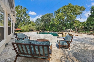 Welcome to this stunning pool home with CONCRETE BLOCK on The Deerwood Country Club in Florida - for sale on GolfHomes.com, golf home, golf lot