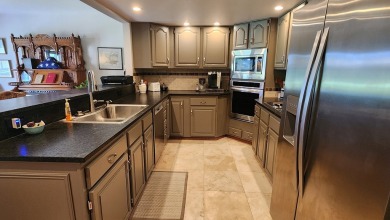Lovely townhome in Kalispell fronting on the fairway at Buffalo on Buffalo Hill Golf Club in Montana - for sale on GolfHomes.com, golf home, golf lot