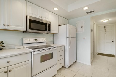 Location, location, location! Prime 2BR/2BA condo in the heart on BallenIsles Golf and Country Club in Florida - for sale on GolfHomes.com, golf home, golf lot