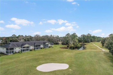 UPSTAIRS END UNIT OVERLOOKING SAPELO HAMMOCK GOLF COURSE WITH on Sapelo Hammock Golf Club in Georgia - for sale on GolfHomes.com, golf home, golf lot