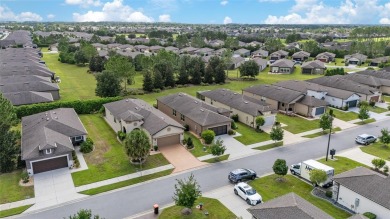 As you pull up to this gorgeous, well-maintained Crestview home on Stone Creek Golf Club in Florida - for sale on GolfHomes.com, golf home, golf lot