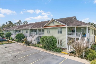 UPSTAIRS END UNIT OVERLOOKING SAPELO HAMMOCK GOLF COURSE WITH on Sapelo Hammock Golf Club in Georgia - for sale on GolfHomes.com, golf home, golf lot