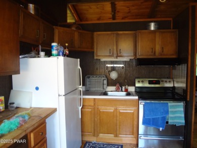 LAKE WALLENPAUPACK HOME IN BEAUTIFUL TANGLWOOD LAKES WITH LOTS on Paupack Hills Golf and Country Club in Pennsylvania - for sale on GolfHomes.com, golf home, golf lot
