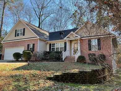 NEW PRICE/NEW PAINT AND CARPET/THIS HOME IS PRICED BELOW TAX on Carolina Trace Country Club in North Carolina - for sale on GolfHomes.com, golf home, golf lot