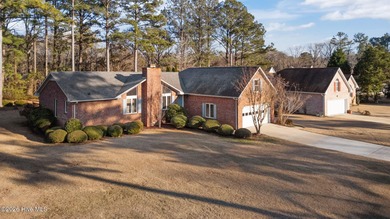 Welcome home to this 3-bedroom, 2-bath residence in the on River Bend Golf and Country Club in North Carolina - for sale on GolfHomes.com, golf home, golf lot