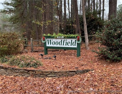 NEW PRICE/NEW PAINT AND CARPET/THIS HOME IS PRICED BELOW TAX on Carolina Trace Country Club in North Carolina - for sale on GolfHomes.com, golf home, golf lot